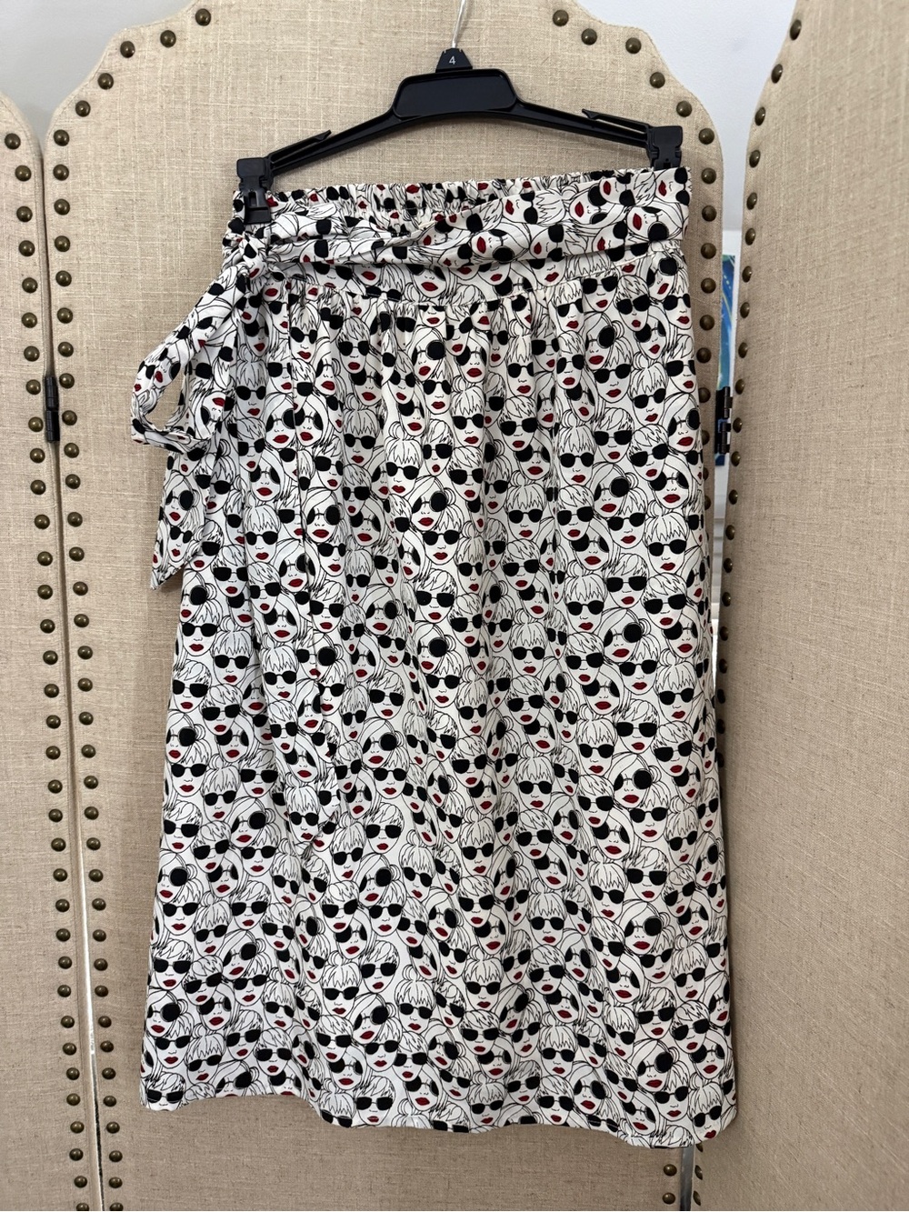 Anthropologie White Midi Wrap Skirt with Black Face Print and Red Accents